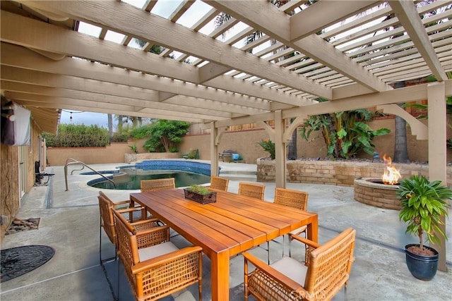 view of patio featuring an outdoor fire pit, outdoor dining space, and a fenced in pool