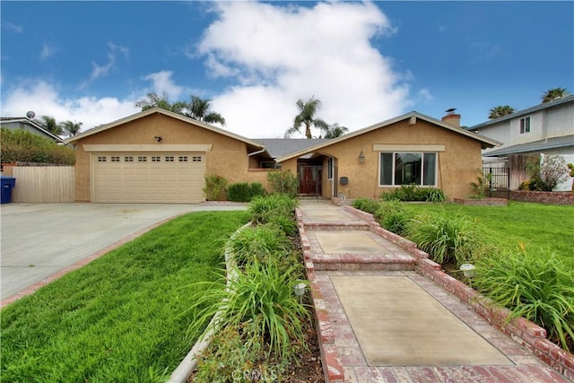 single story home with stucco siding, concrete driveway, an attached garage, a front yard, and fence