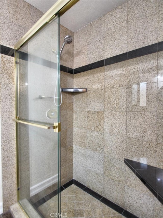 bathroom featuring a stall shower