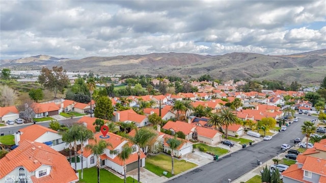 aerial view with a residential view and a mountain view