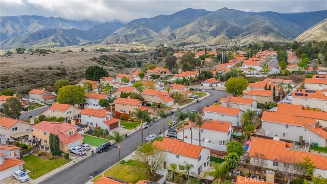 bird's eye view with a residential view and a mountain view