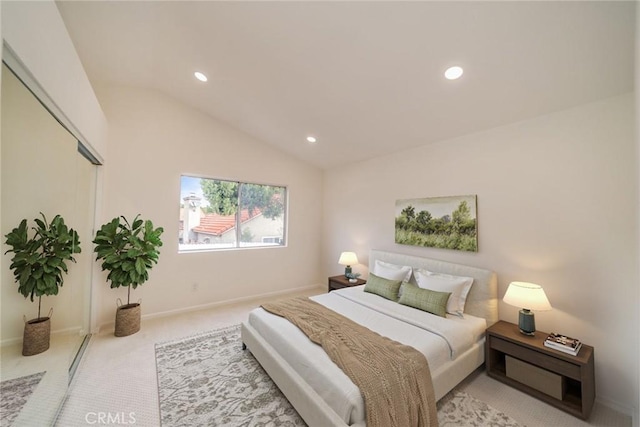 carpeted bedroom with recessed lighting, a closet, vaulted ceiling, and baseboards