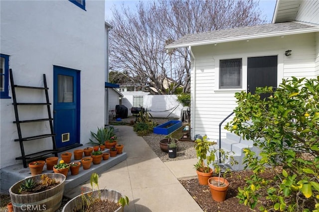 view of property exterior featuring fence