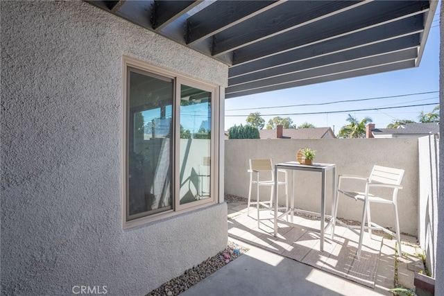 view of patio / terrace with fence