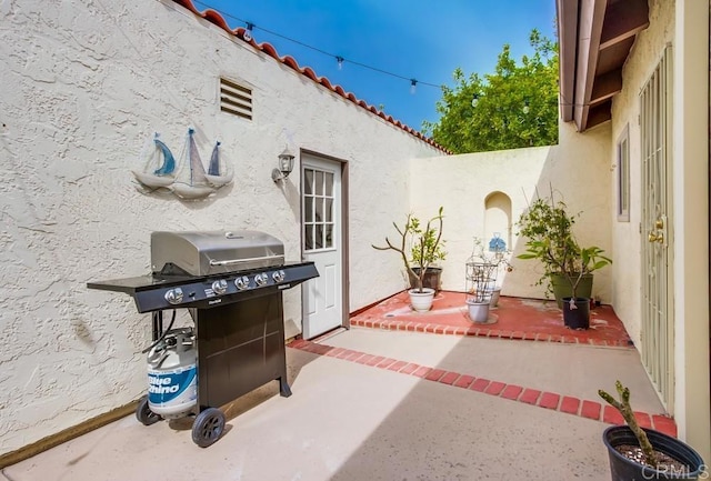 view of patio / terrace featuring a grill