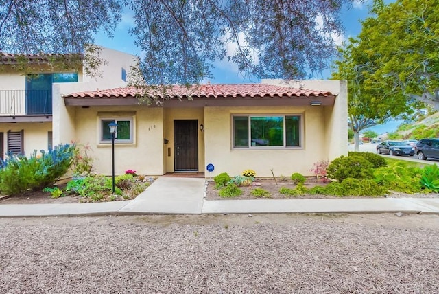 view of front of house featuring stucco siding