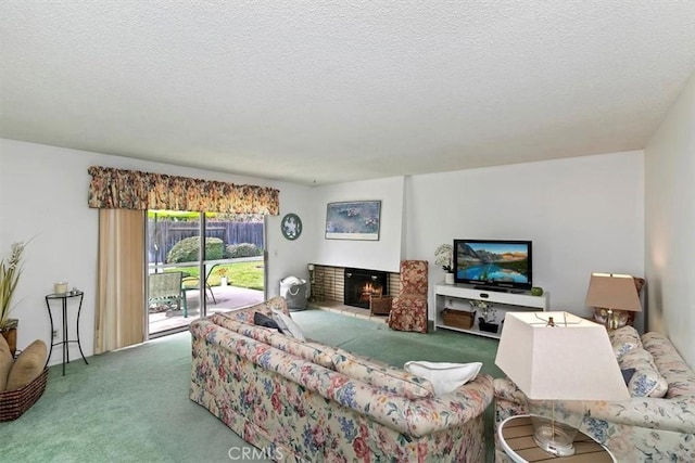 living room featuring a brick fireplace, carpet flooring, and a textured ceiling