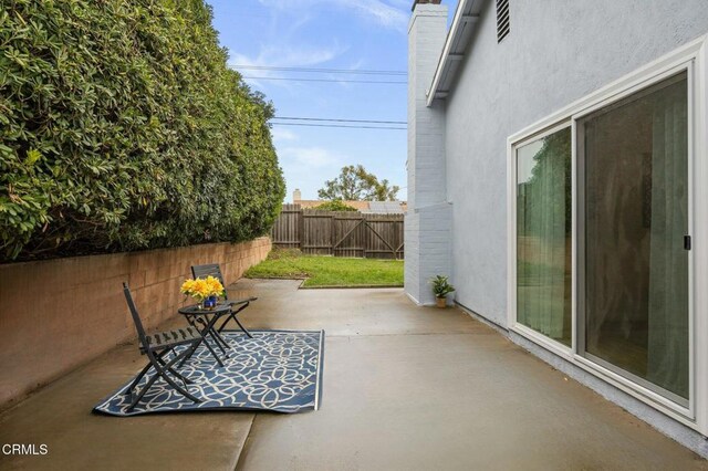 view of patio with fence