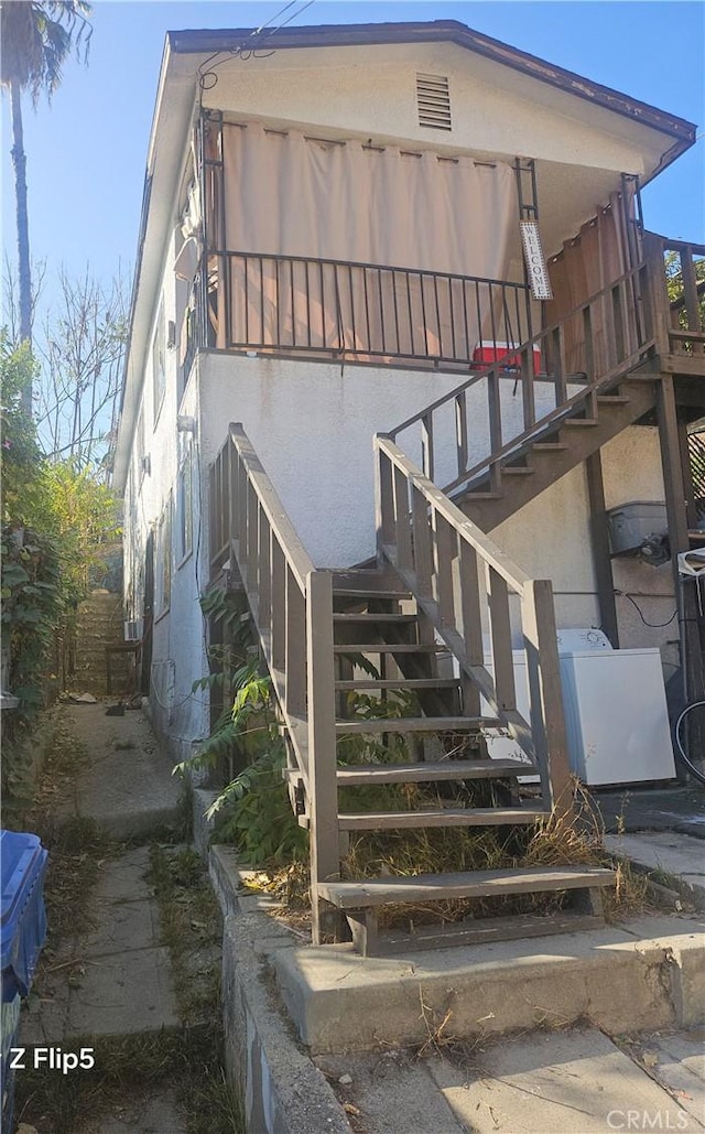 exterior space featuring stairway