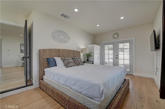 bedroom featuring recessed lighting, visible vents, access to exterior, french doors, and light wood-type flooring