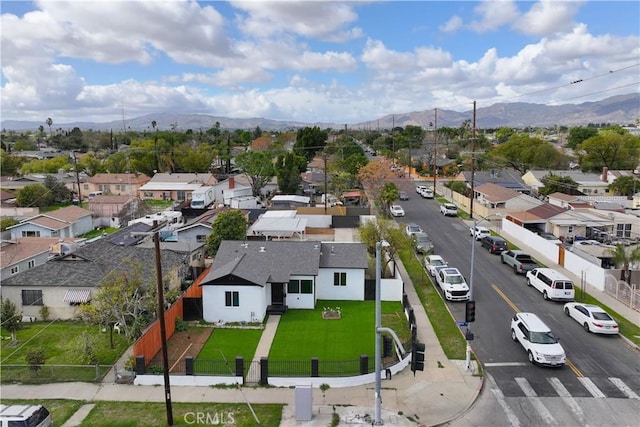 aerial view with a residential view and a mountain view