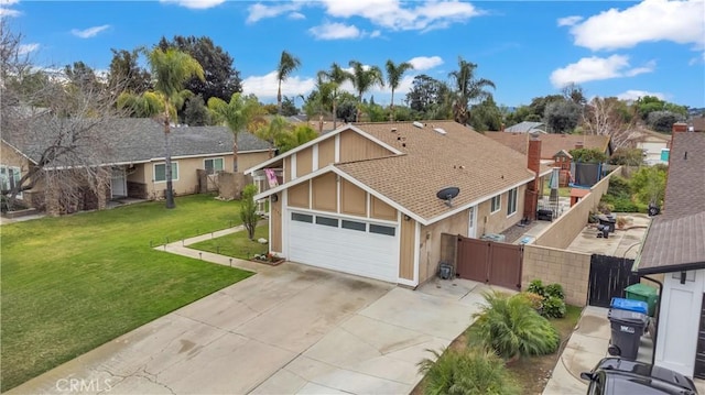 ranch-style home featuring a gate, fence, roof with shingles, concrete driveway, and a front yard