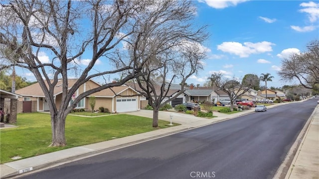 view of road featuring a residential view, curbs, and sidewalks