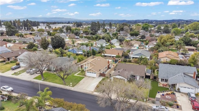 birds eye view of property with a residential view