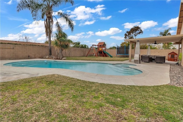 view of swimming pool with a fenced in pool, a playground, a trampoline, a fenced backyard, and a patio