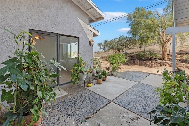 view of patio / terrace featuring fence