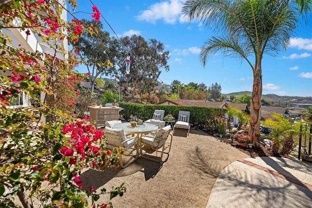 view of patio / terrace with a mountain view