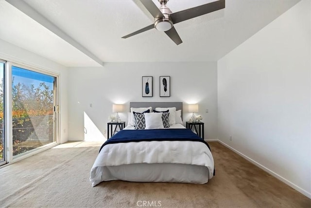 carpeted bedroom with baseboards and a ceiling fan