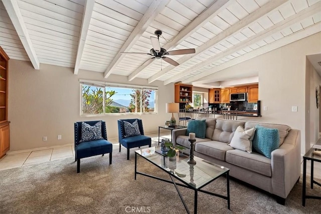 living room with light colored carpet, lofted ceiling with beams, ceiling fan, wood ceiling, and light tile patterned flooring