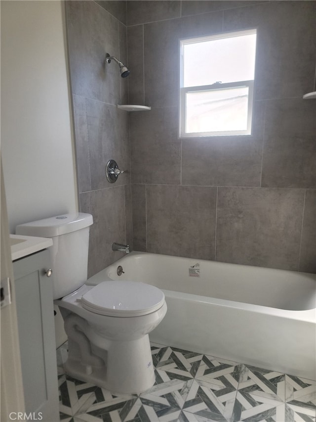 full bathroom featuring toilet,  shower combination, and vanity