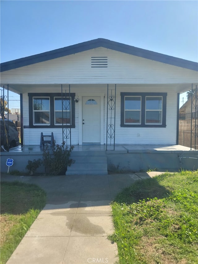 view of front of home featuring covered porch