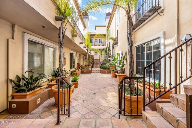 view of property's community featuring a patio