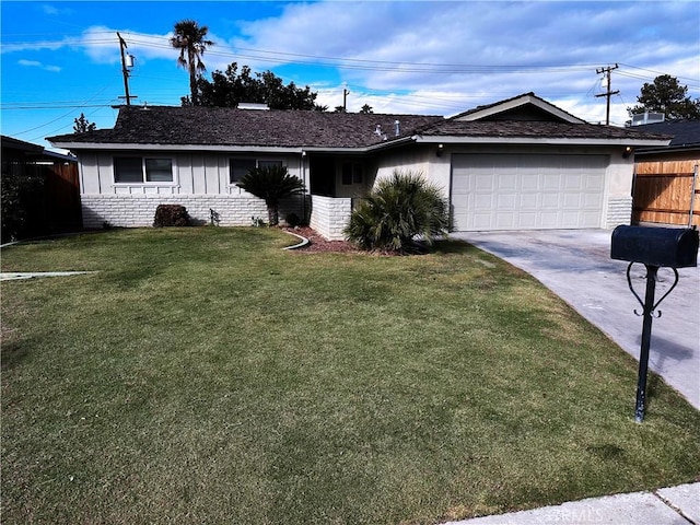 ranch-style home with a garage, brick siding, fence, driveway, and a front yard