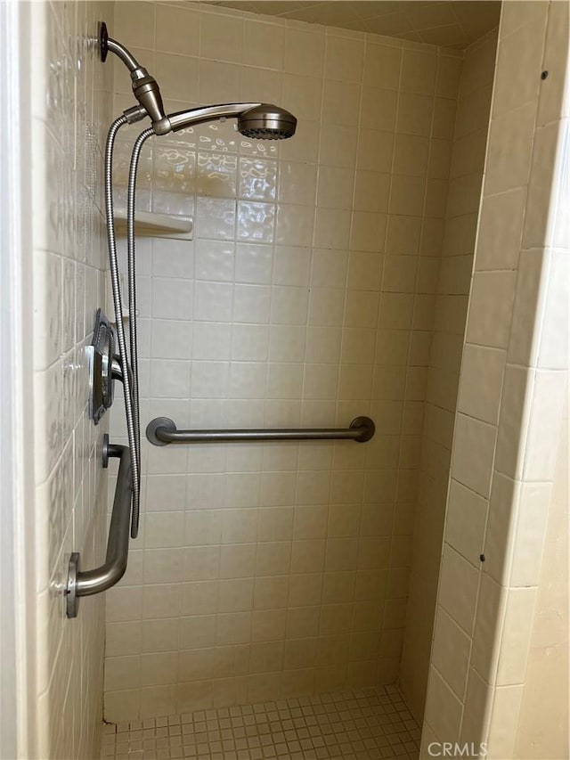 full bath with a shower stall