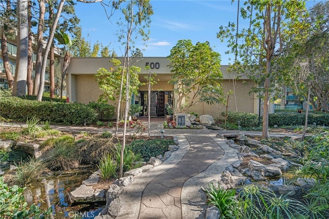 view of front of house with stucco siding