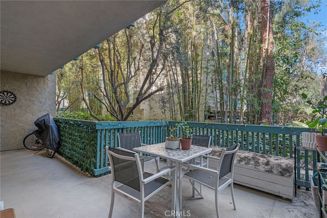 view of patio with outdoor dining area