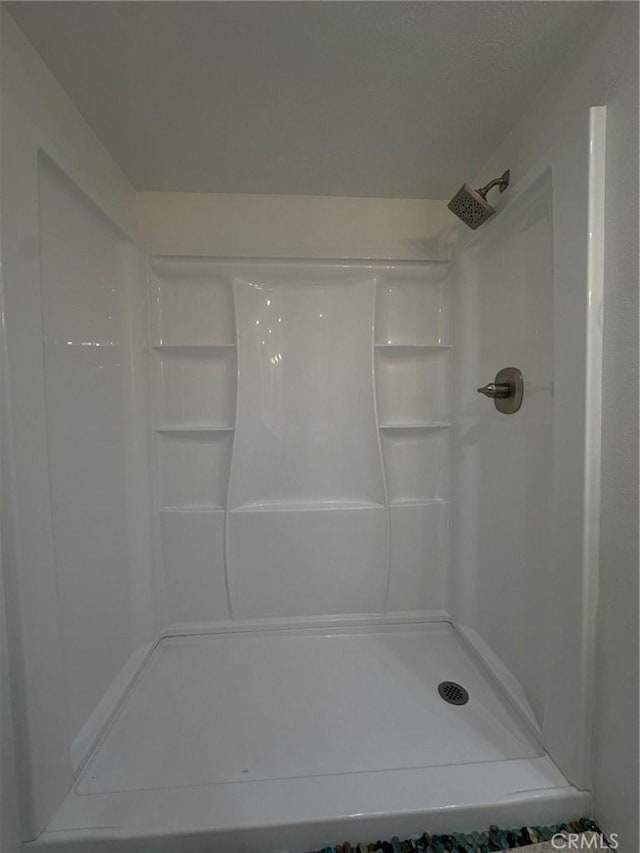 bathroom featuring a shower