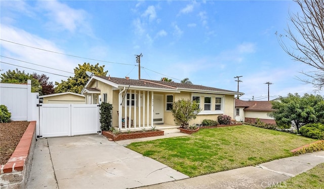 ranch-style house featuring a gate, fence, a front lawn, a porch, and stucco siding