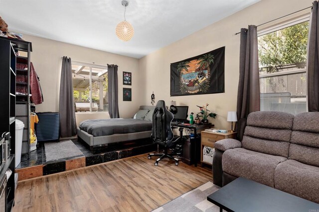 bedroom with wood finished floors