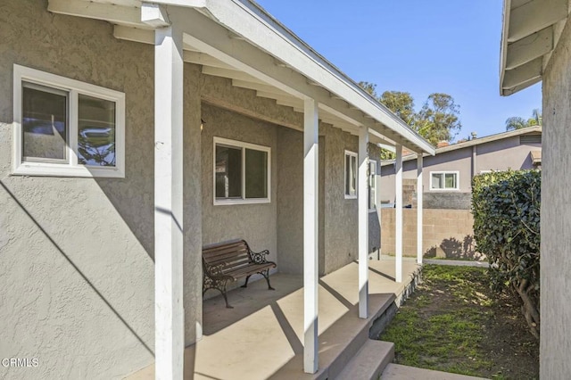 view of patio with fence