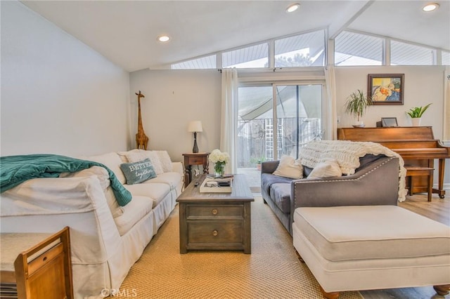 living room with vaulted ceiling with beams and recessed lighting