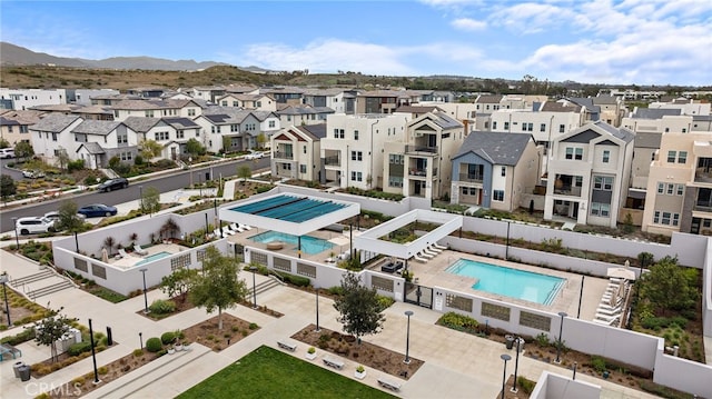 exterior space featuring a residential view and a mountain view