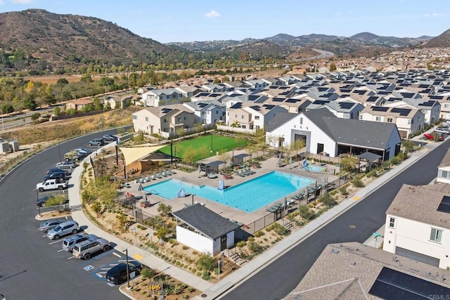 aerial view featuring a residential view and a mountain view