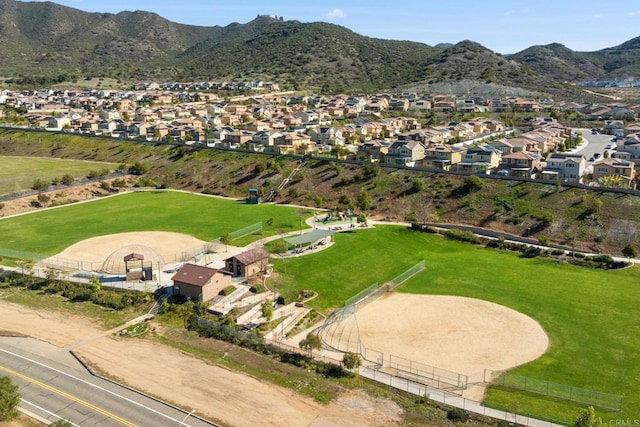 birds eye view of property with a residential view and a mountain view