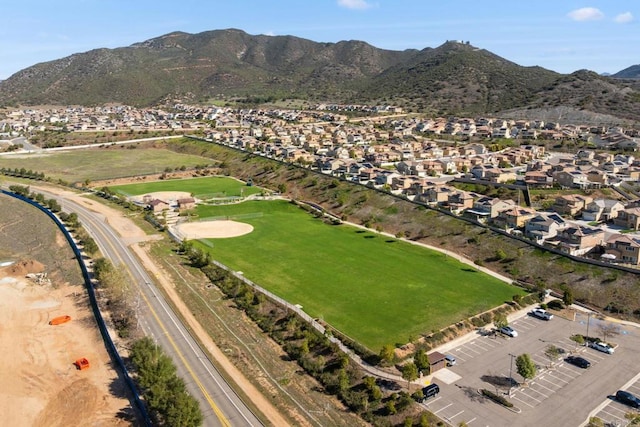 aerial view with a mountain view and a residential view