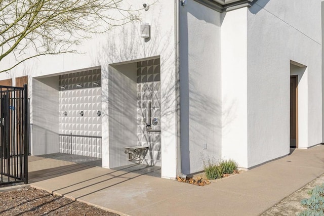 exterior space featuring stucco siding