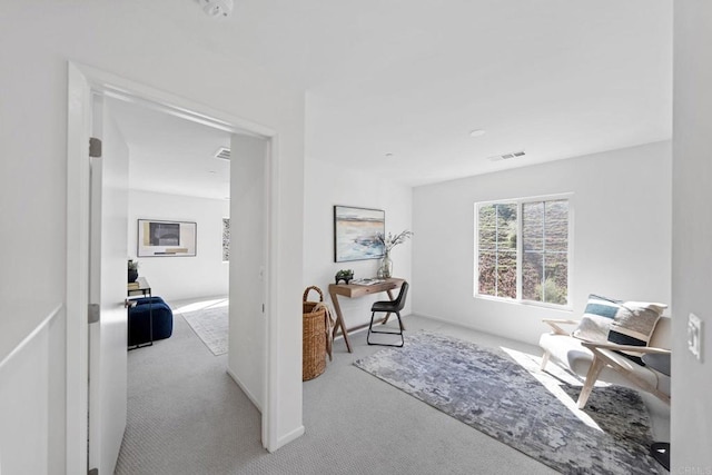 office space with carpet floors and visible vents