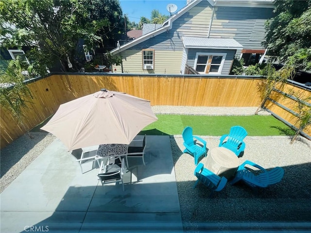 view of patio with a fenced backyard