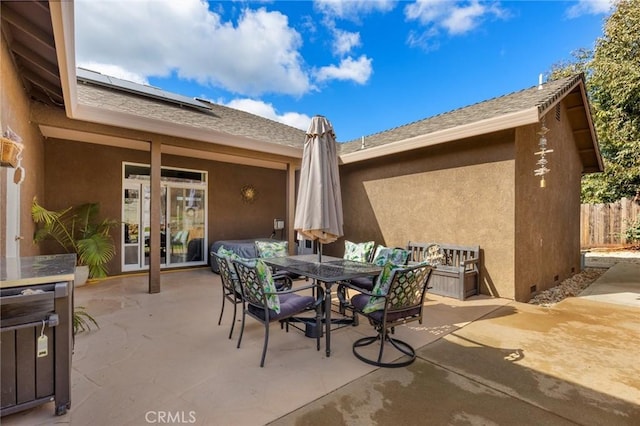 view of patio with outdoor dining area