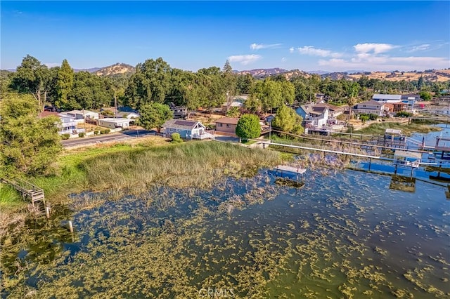 aerial view with a residential view and a water and mountain view