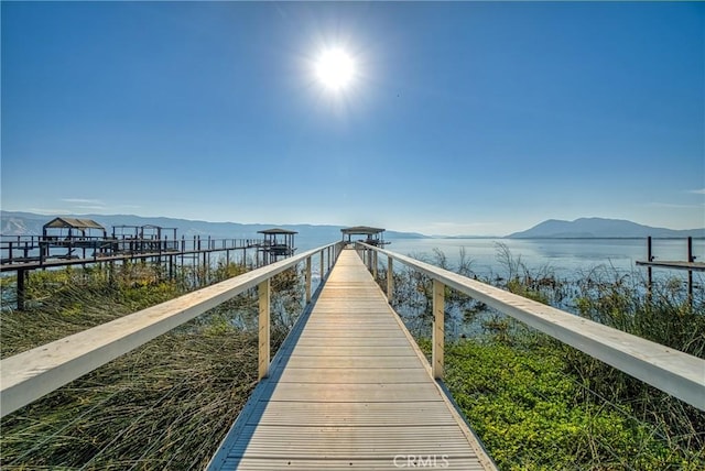 dock area featuring a mountain view