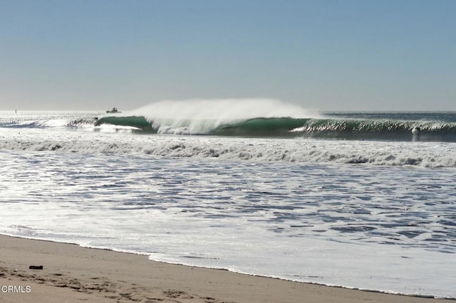 view of water feature featuring a beach view