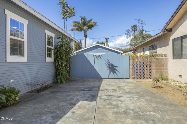 view of patio / terrace featuring fence