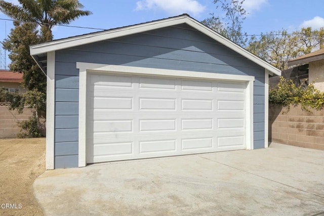 garage featuring fence