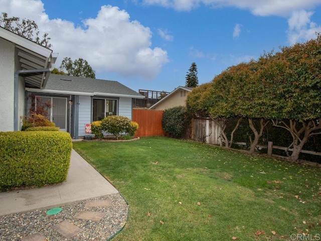 view of yard featuring fence