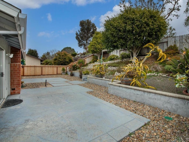 exterior space with a fenced backyard